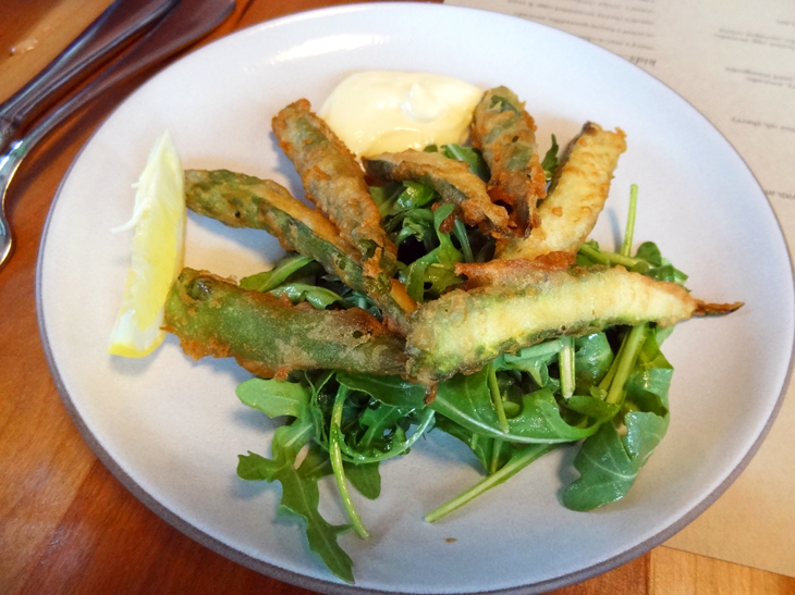 Asparagus tempura with dipping sauce and arugula salad