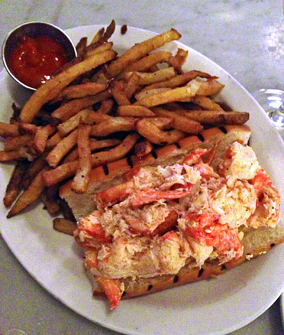 A mound of fries, a mound of lobster meat, a freshly grilled roll... what else do you need?!