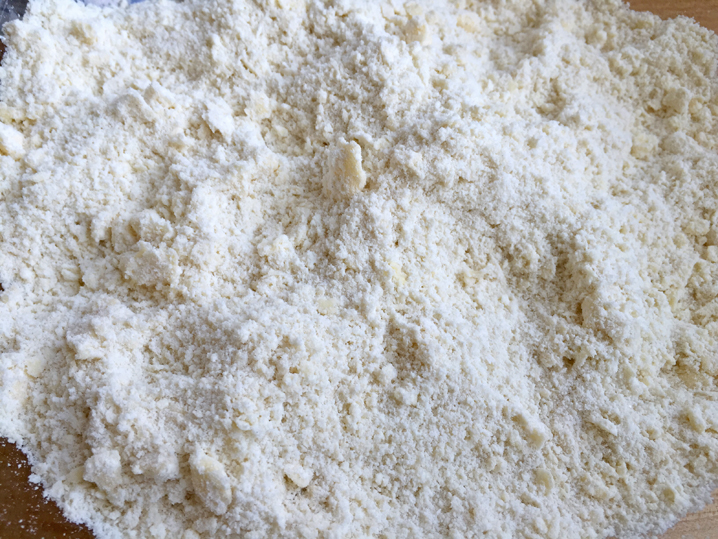 Rub the butter into the dry ingredients until the mixture resembles cornmeal